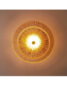 Kinkiet LUXIO w kolorze bursztynowym - nowoczesna lampa LED do salonu, sypialni i biura, elegancki design.