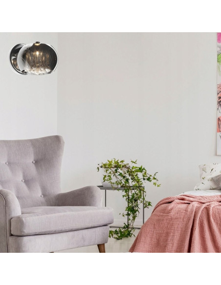 Elegancki kinkiet CRYSTAL z kryształowymi akcentami, szklany i metalowy, idealny do nowoczesnych wnętrz.