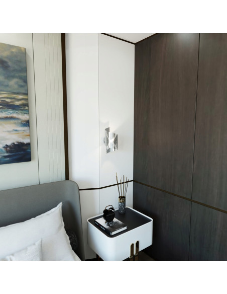 Kinkiet SPIRAL w kolorze srebrnym – nowoczesne oświetlenie minimalistyczne do salonu i innych wnętrz.